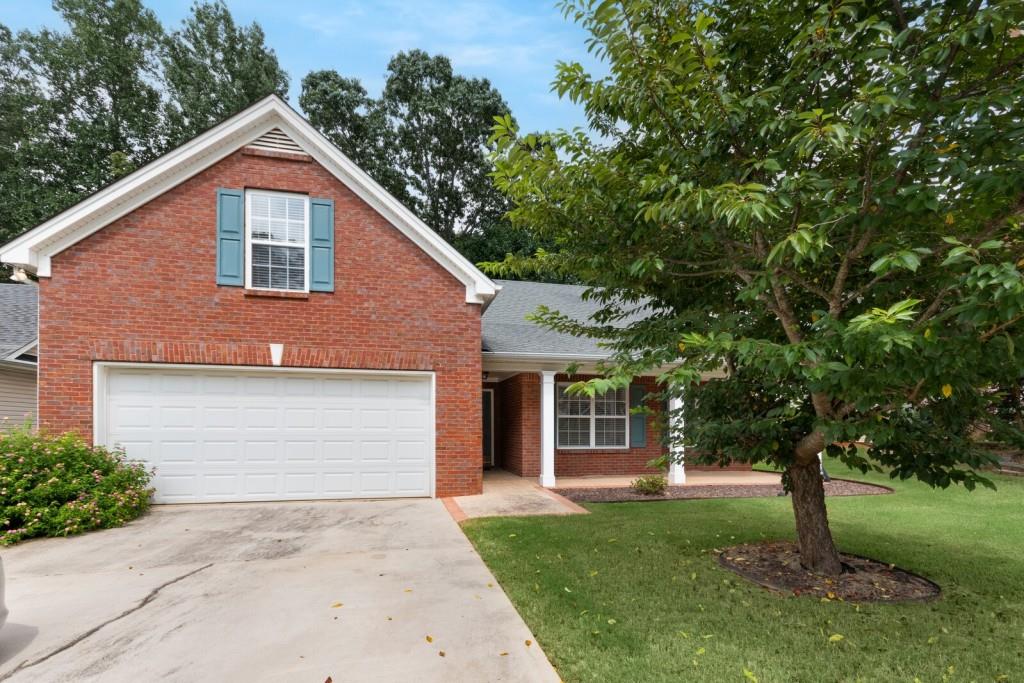 Charming Ranch Home in Desired Collins Hill High School. Kitchen Features Granite Countertops, Tile Backsplash and Hardwood Floors With Cozy View to Family Room/Fireplace. Spacious Master Suite & Master Bath with Double Vanities, Separate Tub & Shower and Walk In Closet. Secondary Bedrooms Include Vaulted Ceilings & Walk In Closets. Private 2nd Floor Bedroom W/Full Bathroom. Enjoy World Class Shopping & Entertainment W/Mall of GA & The Exchange at Gwinnett. Hurry, Won't Last Long!