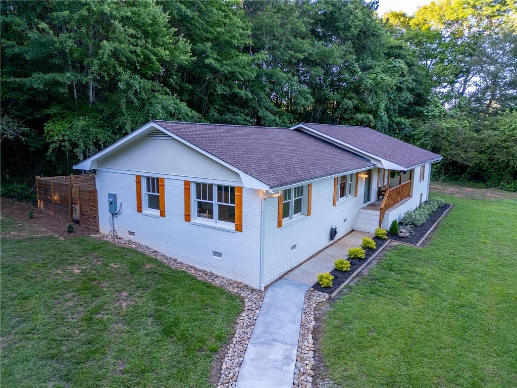 This property is located down a gravel road that is approximately 0.25 miles long! Welcome to this charming 4-sided brick ranch nestled on 6.79 acres in the heart of Mount Airy. This recently
renovated home offers the perfect blend of privacy, space, and convenience. A peaceful creek runs through
the property. Inside, you'll find a versatile bonus room that can serve as an office, sunroom, or
entertainment space—ideal for today’s flexible lifestyle.
Enjoy the benefits of a large, private parcel while still being just minutes from downtown Clarkesville and
Cornelia. You’re close to local shopping, dining, and vibrant community events. With quick access to
Highway 365, commuting is easy, all while enjoying the quiet comfort of the countryside. You're near
everything Habersham County has to offer, including top-rated schools and outdoor recreation.
