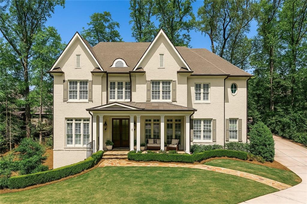 Live on one of Chastain Park’s most desirable streets, with direct access to the park.
This well-designed six-bedroom home features seven full and two half baths across three spacious levels. Move-in ready, it offers generous living spaces ideal for both everyday life and entertaining.
The main level includes a large kitchen with marble countertops, a butler’s pantry, and an expansive walk-in pantry. Bathed in natural light, the kitchen opens to a comfortable family room. Adjacent is a sizable breakfast room with access to the grilling deck and stairs leading to the terrace level. Additional features include a formal powder room, an oversized dining room, a private office or guest bedroom with ensuite bath, and a well-equipped mudroom with a casual half bath and built-in cubbies for organized storage.
Upstairs, the primary suite offers a peaceful retreat with spacious walk-in closets, dual vanities, a walk-in shower, and a soaking tub. Three additional bedrooms each include ensuite baths and ample natural light. An oversized playroom with a full bath provides flexibility for guests or recreation.
The terrace level includes a large living area with walk-out access to the backyard, a private sixth bedroom for guests or an au pair, a dedicated gym and full bath along with two large storage rooms.