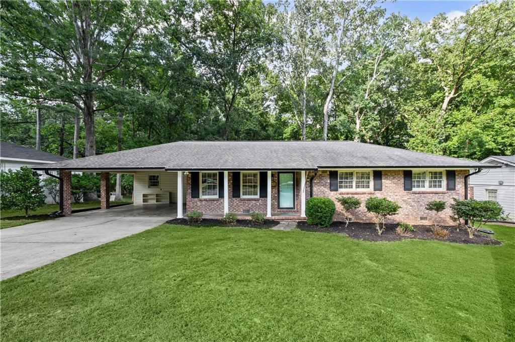 Welcome to 4470 Lake Ivanhoe Drive, a charming all-brick stepless ranch located minutes from shopping, dining, local parks, and quick access to both I-285 and I-85. This beautifully updated home offers a perfect blend of comfort, modern upgrades, and timeless style and is move-in ready. Also, it's Zoned for Livsey Elementary—a STEM-certified school.
From the moment you arrive, you’ll appreciate the low-maintenance brick exterior and inviting curb appeal. Inside, the home opens to a light-filled living room with gleaming hardwood floors, fresh neutral paint, large windows, and a ceiling fan for year-round comfort. The layout flows easily into the dining area and updated kitchen, creating a warm and functional space for everyday living and entertaining. The kitchen offers granite countertops, stainless steel appliances, crisp white cabinetry, and a cozy breakfast area overlooking the backyard.
This home features two renovated bathrooms with stylish tilework, updated fixtures, and a clean, modern aesthetic. Your primary suite offers a peaceful retreat, while the two secondary bedrooms are bright, versatile, and ideal for guests, or a home office.
Step outside to enjoy the backyard—perfect for pets, play, gardening, or weekend barbecues. A detached storage shed provides convenient space for tools and lawn equipment, and the 2-car carport adds covered parking and everyday ease. Additional features include a NEW A/C unit and newer gutters.
Outdoor enthusiasts will love the home’s proximity to several top-rated parks and recreational spots. Henderson Park, one of the highest-rated in the area, offers walking trails, a waterfall, tennis courts, soccer fields, and a community garden. Nearby Tucker Nature Preserve provides a peaceful escape with short hiking trails, beehives, and a pollinator meadow. Lake Erin Trails delivers scenic hikes with varying difficulty levels and is great for family outings. Kelley Cofer Park features a lake, playground, ball fields, swimming pool, orchard, and nature trails—all just a short drive away.
For golf lovers, Heritage Golf Links is a nearby public course offering three nine-hole layouts and a driving range, perfect for practicing your swing or enjoying a weekend round with friends.
If you're looking for a well-maintained, move-in ready home with timeless charm and modern upgrades, all on a single-level layout, this is the one. Don’t miss your opportunity to own this updated stepless ranch in the heart of Tucker. Come experience 4470 Lake Ivanhoe Drive today—homes like this don’t last long!