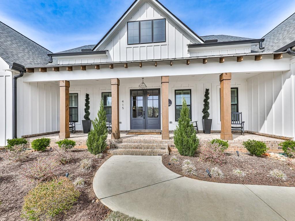 WELCOME HOME!
Welcome to this exquisite 2023 custom-built home in the highly sought-after gated community Tate Reserve subdivision of Ball Ground, GA! Nestled on a sprawling 1.67-acre corner lot, this 5-bedroom, 4.5-bathroom home is one of the largest and most desirable properties in the community, boasting 4,166 sq. ft. of thoughtfully designed living space. Designed to complement the beautiful modern farmhouse-style homes throughout the neighborhood, this residence offers both elegance and functionality. Some of the main level features include an Open-concept kitchen & living area perfect for entertaining, a Spacious master suite with a luxurious en-suite bath, Three additional secondary bedrooms with two full bathrooms, Guest half-bath for added convenience!
There is Dedicated office space and a Versatile flex room ideal for an extra bedroom, playroom, or second office
Upstairs you will find a Large private bedroom with its own full bathroom perfect for guests or a teen suite!
Outdoors you will find an Expansive back deck spanning the width of the home with a Covered bar area overlooking a huge cleared backyard! This home sits on One of the largest & most usable lots in the neighborhood! In addition to all these amazing things this home has one of the few Three-car garages in the neighborhood perfect for parking and storage!
This exceptional home offers the perfect blend of luxury, space, and privacy, all within the serene, gated community of Tate Reserve! In addition to the clubhouse space, you can also hike around the 25 acres of land designated for conservation and hiking trail trails! The trailhead is conveniently located a short distance from this home! Conveniently located near crystal Falls lake and golf club, shopping, dining, and major highways, this is a rare opportunity to own one of the most impressive homes in the neighborhood.
Schedule your private tour today!