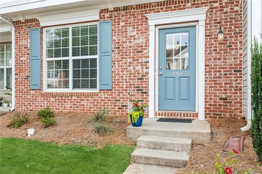Move-in ready townhome in a GREAT LOCATION and highly desirable community with two pools, playground, and green space. Whether you need the convenience of being minutes from GA-400, Halcyon, Avalon, schools, dining, parks, and shopping or easy maintenance living in a well kept neighborhood, this is the home for you. This home is tucked away near the back of the neighborhood and steps from greenspace. Enjoy the open concept living area with tons of natural light and fresh paint. The cozy fireside living area leads to an open kitchen with eat in dining and views of the backyard and patio. Upstairs you will find an oversized primary and ensuite, two additional bedrooms and bathroom, and laundry room with a washer and dryer that stays with the property. This is a great investment whether you are a savvy buyer looking for yourself or an investor looking for an income producing opportunity. Call today to schedule a showing and make this home yours.