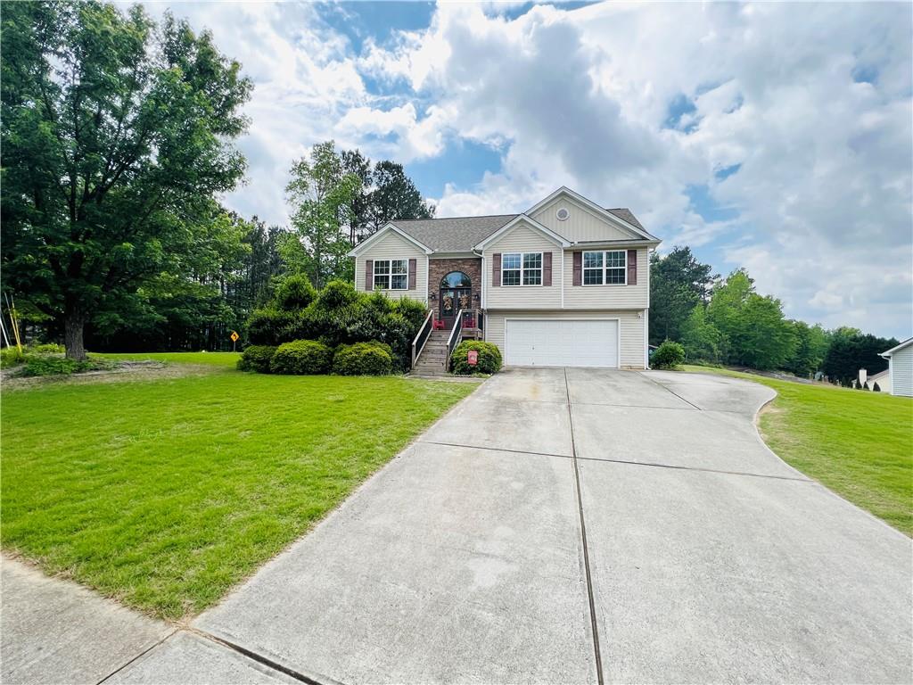 5 BEDROOMS, 3 FULL BATHS ON .80 ACRE LOT WITH NO HOA! 3/2 ON MAIN LEVEL AND 2/1 IN LOWER LEVEL MAKES THIS A GREAT LAYOUT FOR MULTI GENERATIONAL FAMILIES OR A TEEN SUITE ON LOWER LEVEL. DECK/PATIO PERFECT FOR COOKING OUT, OVERLOOKS SPACIOUS BACKYARD FOR ENTERTAINING. LONG, LEVEL DRIVEWAY, LARGE 2 CAR GARAGE W/TONS OF EXTRA STORAGE SPACE. THIS HOME HAS GREAT SPACE AND IS READY FOR YOUR UPGRADES!