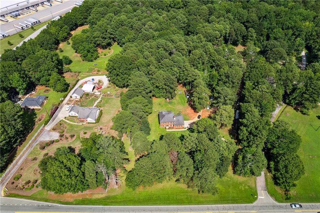 Nearly 1.5 acres of residential land available in the desirable McDonough area of Henry County. This property offers a rare opportunity to own a spacious parcel with paved road access and a peaceful setting while remaining close to everyday conveniences. The lot features a serene environment surrounded by natural beauty, making it an excellent site for building a custom home. With plenty of space, buyers will enjoy the flexibility to design a residence that suits their needs, along with options for outdoor living, gardens, or additional structures. The size and layout of the land provide privacy and room to grow. Located just minutes from downtown McDonough, the property benefits from easy access to shopping, dining, schools, and local parks. The historic McDonough Square offers restaurants, retail, and community events, while major highways make commuting to Atlanta or the airport straightforward. This residential parcel combines space, convenience, and accessibility in a fast-growing community. Whether you're planning to build now or hold as an investment for the future, this lot is a valuable opportunity in one of the most sought-after areas south of Atlanta.