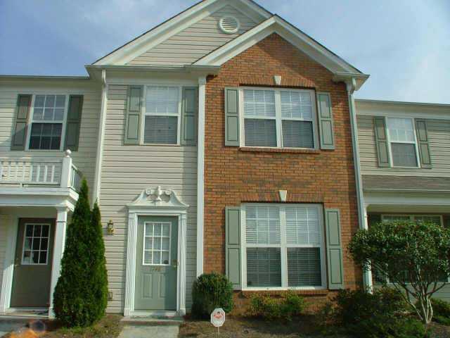 Spacious 2 BR/2.5 BA Townhouse across from Lake. Excellent Condition w/Beautiful Decor. Bright Ktchn w/Breakfast Bar, Sep Dining Area, Grt Rm w/FP. Mstr w/Vaulted Ceilings, Walk-in Closet, Double Vanities in Bath and Tub/Shower Combo. Lg Guest Rm w/Priv Bath. A Must See!!