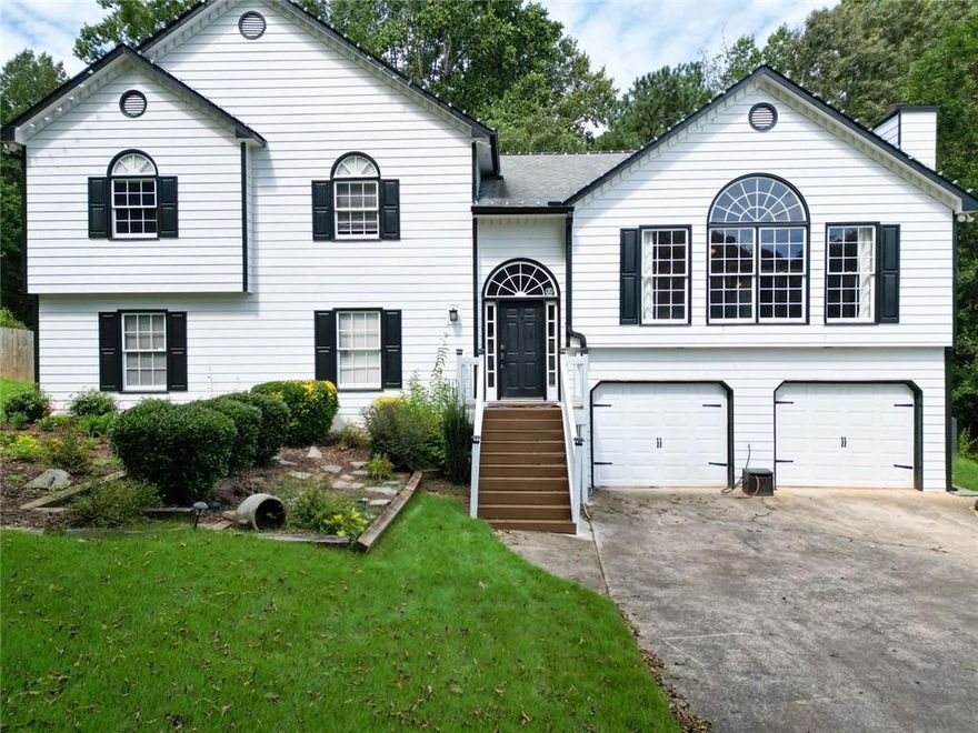 Step into this beautiful, move-in ready home!
A spacious foyer welcomes you into the light-filled living room, highlighted by a striking stone-stack fireplace. The semi-open dining room flows seamlessly into the renovated kitchen, complete with granite countertops, a tiled backsplash, and crisp white cabinetry, perfect for everyday living or entertaining.

Enjoy cozy fall evenings in your four-season sunroom, which opens directly to a fully fenced backyard. Just beyond, a private hot tub retreat awaits, tucked beneath the shade of mature trees.

Inside, the large primary suite offers a relaxing ensuite bath with a soaking tub, double vanities, and a step-less shower. Two additional bedrooms and a full bath complete the upstairs level.

Downstairs, discover a versatile “in-law” or “teen suite” featuring an expansive bonus space, closet, and full bathroom. An expansive, fully fenced backyard is perfect for a pool, play set or for throwing the football. 

With newer systems, appliances, and fixtures already in place, you can move in with peace of mind. Schedule your tour today and see everything this home has to offer!