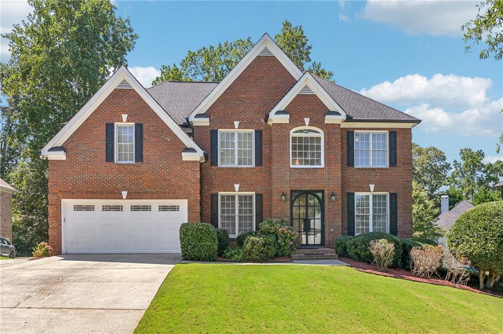 Discover a home that truly has it all in the sought-after Shiloh Farms community where you get an Alpharetta address with Forsyth county taxes! This home boasts over 5,200 sq/ft of finished living space, an east-facing residence that combines elegance, comfort & functionality in EVERY detail.
Step into the open, light-filled floor plan with soaring ceilings & walls of windows that create a space that feels bright, inviting and perfect for both everyday living & large-scale entertaining. On the Main Level is a Bedroom Suite complete with full Bathroom. The Chef’s Kitchen, complete with granite countertops, stainless steel appliances, large center island & sun-drenched breakfast nook, opens seamlessly to an exquisite 2-story Great Room & and Sunroom. This home is a dream come true for plant lovers!
Upstairs, the Primary Suite offers a peaceful retreat with a spa-inspired Bath and a large walk-in closet. Secondary bedrooms include an en suite and a Jack & Jill, providing plenty of flexibility for family or guests.
The finished Terrace Level is an entertainer’s delight & an ideal setup for multi-generational living. With exquisite finishes, two additional bedrooms, a full bath with double vanity + ½ bath , a stylish living space with a granite kitchenette/wet bar is designed for comfort and privacy. From here, step out to the oversized tiled Lanai, Backyard or up to the expanded Deck, where you’ll enjoy an unobstructed view of sweeping sunsets each evening.
Additional features include fresh interior paint, glass front door, luxurious light fixtures, NEW carpet upstairs, epoxy-coated garage floor, tiled Patio and professional landscaping. The active community offers numerous events throughout the year, clubs & social groups, resort-style amenities including a pool, tennis, clubhouse & playground, all within minutes of Halcyon, Big Creek Greenway, The Collection, Fowler Park, GA-400 and top-rated Forsyth County schools.
This home isn’t just a place to live—it’s a lifestyle. Schedule your private showing today.