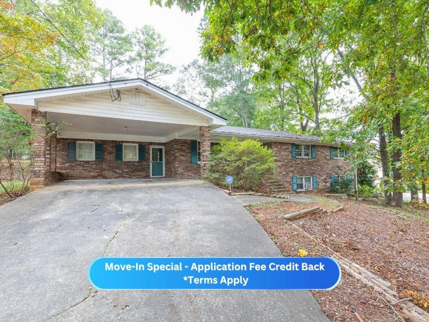 APPLICATION FEE CREDIT BACK TOWARDS RENT IF LEASED BY 11/1/25 -

Experience stylish living in this beautifully renovated 3-bedroom, 2-bath brick home, ideally situated on a spacious corner lot. Enjoy the convenience of a full basement and a 2-car carport, providing both comfort and practicality.

Step inside to find elegant flooring and fresh, modern paint throughout. The updated eat-in kitchen is a chef's dream, featuring stainless steel appliances, sleek quartz countertops, a breakfast bar, and abundant cabinet and counter space, plus a cozy dining area perfect for meals.

Host unforgettable gatherings in the generous family room by a decorative fireplace, relax in the separate living room, or savor the outdoors on your back patio overlooking a large, fenced backyard ideal for entertaining or unwinding.

The primary suite offers a walk-in closet and a private bath with a tub/shower combo. 2 additional bedrooms are well-sized and share a full hall bathroom, which also includes a handy laundry chute.

A full, unfinished basement provides endless potential for extra storage, a workshop, or customized bonus space to fit your needs. This move-in-ready home is the total package.

Situated in a prime location, you're just minutes away from shopping on Barrett Parkway, Town Center Mall, the Woodstock Outlet Mall, and have easy access to I-75 and I-575. Plus, you're in close proximity to Kennesaw State University, Marietta Square, Downtown Kennesaw, Downtown Woodstock, and much more. Don't miss out on making this beautiful house your new home!

This property is eligible for deposit alternative coverage in lieu of a security deposit. Eligibility requirements apply. For details and enrollment, please contact our leasing team and enjoy a deposit-free renting experience!

Specialized Property Management residents are enrolled in the Resident Benefits Package (RBP) for $42.00/month which includes tenant legal liability insurance, HVAC air filter delivery (for applicable properties), credit reporting, renter rewards program, and much more!