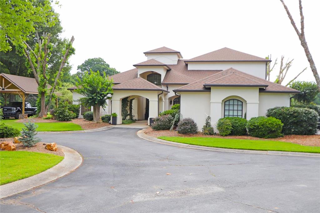 This is the one you are looking for! Your own taste of paradise! This 5 Bedroom/3.5 Bathroom Mediterranean Mansion boasts so much it can’t all be put in this description. But here goes! This Astonishing Home boasts: Gated Entry, 3-Car Garage, Brand New Parking Pavilion, Barn with Loft, Electricity & Water, Tranquil Pond, Large Veranda opened to Saltwater Pool, Cabana, & Hot Tub and providing Access to Master, Dining, & Bath, Balcony overlooking Breathtaking Backyard, The Kitchen will leave you speechless w/ Exterior vented Vents, Island w/ reach-in cooler, Large Walk-in Pantry, Custom Paneled SubZero Refrigerator, Commercial Grade Range/Double Oven, Concrete, Granite, & Solid Surface Countertops Throughout, Tile & Hardwood Floors Throughout, 8 Foot Interior Doors Throughout, Master Suite on Main & Additional Upstairs Master Suite, Laundry/Mud Room, Amazing Walk-In Closets w/ Built-In Cabinets, Master Bathroom with Separate Tub & Duel Nozzle Tiled Shower, Sound Proof Bonus Room, Exercise/Library Room, Large Dining Room w Built-in China Cabinet/Buffet, Large Breakfast Area, Elegant & Tranquil Family/Great Room w/ Fireplace, Tankless Water Heater, 3 HVAC (Duel Fuel) Systems, Inground Trampoline, on 3.04 Acres, and more...