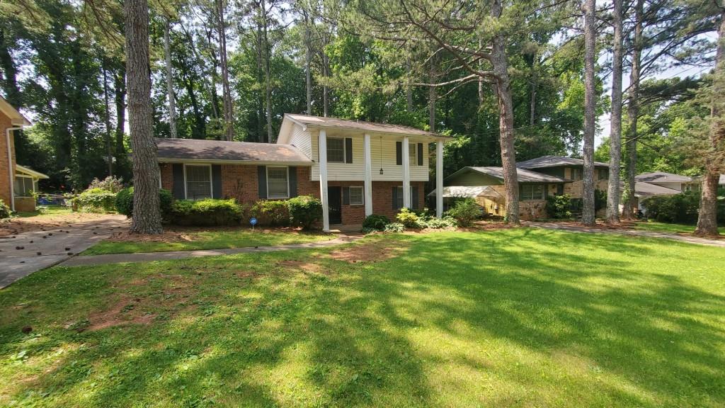 Investment or flip opportunity! Or DIY...Typical 4/2 spilt level in Decatur. Upper level had 3BR/1B and lower level has 1BR/1B. Main level is kitchen, dining and living. Spacious back yard. Good size and floor plan. Needs rehab to market or move-in. Sold "as is".