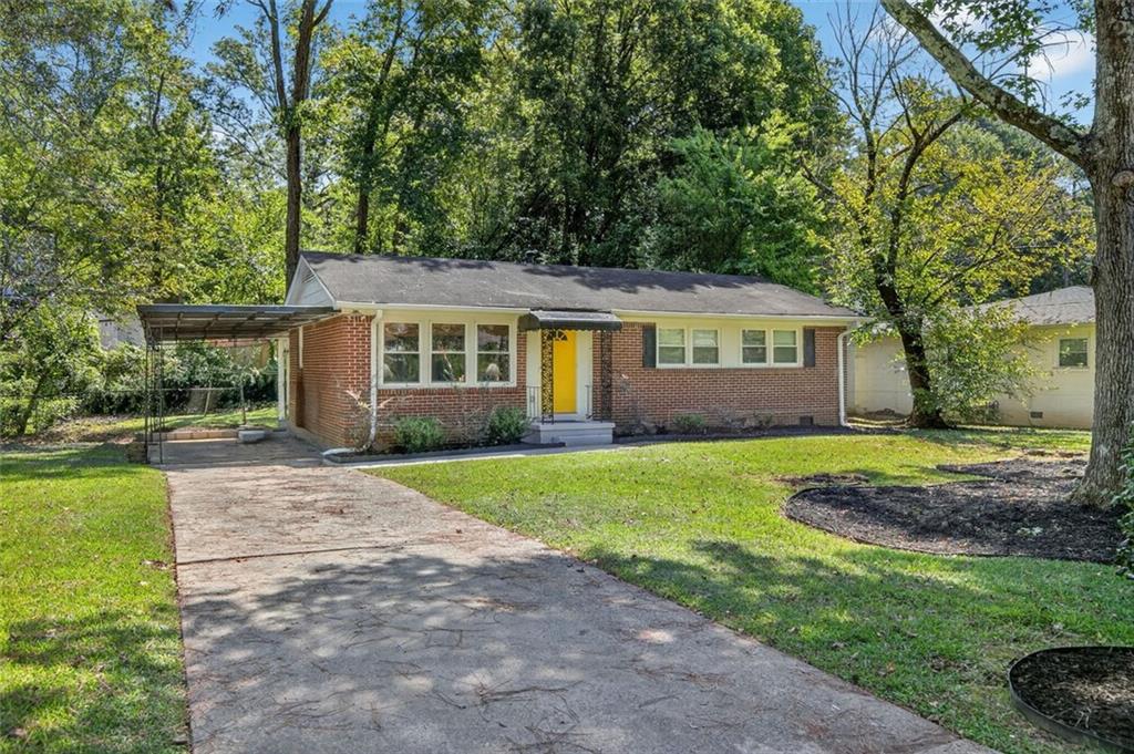 Welcome to this inviting brick ranch in the East Lake Terrace area of Decatur, where charm, functionality, and location come together to create a special opportunity. From the moment you arrive, the welcoming curb appeal, the quiet street across from a quaint linear park, and the established landscaping, make this home stand out. Inside, hardwood floors extend throughout the living spaces, offering both warmth and timeless appeal. A double-cased opening connects the living room to the dining area, creating a natural flow and an easy sense of comfort.
Just off the kitchen, a utility room connects directly to the covered carport. Perfect for a freezer, mudroom, or everyday drop zone, this space adds versatility and convenience with an additional exterior entry—making daily comings and goings seamless, whether you’re unloading groceries, managing pets, or organizing storage. From the dining area, French doors open to a screened porch, a charming bonus space ideal for morning coffee or relaxed evenings enjoying the breeze without the worry of insects.
The primary bedroom includes the rare convenience of a private half bath, while the additional bedrooms share access to the main bathroom, which also incorporates a dedicated laundry area. A linen closet at the end of the hall adds extra storage and practicality. The backyard provides plenty of space to enjoy as it is or personalize with landscaping, gardening, or play areas.
Beyond the property itself, the location adds exceptional value. East Lake Terrace is a well-established neighborhood known for its quiet streets, mature trees, and close proximity to some of Atlanta and Decatur’s most beloved destinations. A short drive brings you to East Lake Golf Club, home of the PGA Tour Championship, where history and tradition meet modern golf excellence. Downtown Decatur is minutes away with its vibrant mix of restaurants, coffee shops, boutiques, and cultural attractions. The nearby MARTA station makes commuting a breeze, whether you’re headed to downtown Atlanta, Midtown, or the airport. The Beltline, Kirkwood, and East Atlanta Village are also close at hand, offering trails, parks, dining, and nightlife.
Whether you’re searching for your first home or considering an investment property in a desirable intown location, this East Lake Terrace ranch delivers both vintage character and practical updates. With a flexible floor plan, classic details, and a location that blends neighborhood charm with city convenience, it represents not only a smart investment but also a truly welcoming place to call home.