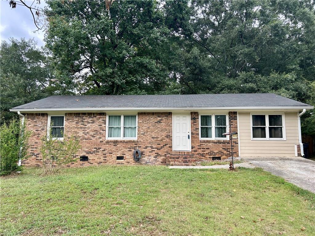 This charming 4-sided brick home features three spacious bedrooms and 2 bathrooms, making it an ideal choice for families or those seeking extra room. The property's standout feature is its large, level backyard, perfect for outdoor activities or gardening, and it includes a shed for additional storage or workspace. Inside, you'll find a bonus room that can serve various purposes, such as a home office, playroom, or media room, providing extra flexibility in how you utilize the space. While the home has great potential, it is in need of some tender loving care (TLC), allowing you to customize and update it to your personal style. With its great space and desirable features, this property offers a fantastic opportunity for buyers looking to invest in a home they can make their own.