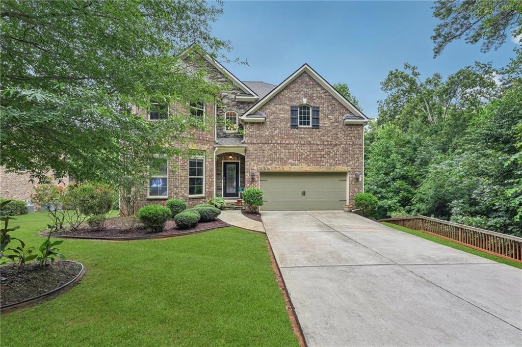 Step Into Elegance At This Custom-Designed Home Nestled In The Desirable Canterbury Community. This Four-Sided Brick Home Boasts Four Generously Sized Bedrooms And Four Full Bathrooms On A Full Daylight Basement. The Chef's Kitchen Features 42' Custom Cabinets And Hardware, Stainless Steel Appliances, Granite Countertops And Oversized Kitchen Island With Additional Storage. The Impressive Family Room Showcases An Open Concept Layout, Complete With A Stacked Stone Fireplace Featuring Glass Doors And Gas Logs, While Natural Light Pours Through The Wall Of Windows With The Kitchen In Full View. Classic Walnut Hardwood Floors Are Featured Throughout The Main Level. Located Upstairs, The Primary Suite Offers A Relaxing Sitting Area, Granite Countertops, Porcelain Undermount Sinks, And A Luxurious Frameless Glass Walk-In Shower. Alongside The Primary Suite, Three Secondary Bedrooms Also Include Spacious Closets. The Full Daylight Basement Is Framed And Waiting To Be Finished With Your Custom Floor Plan Design Which Can Incorporate A Media Room And Additional Bedrooms And Bathroom As Desired. Located In The Award Winning School District Sprayberry High School, Daniel Middle School, And Blackwell Elementary. This Prime East Cobb Location Also Offers Quick Access To Shopping (Kroger, Publix, Target, Home Depot), Dining, Healthcare, And Major Highways I-75 and I-575. Don't Miss Your Opportunity To Own This Exceptional Home In One Of East Cobb's Most Desirable Communities.