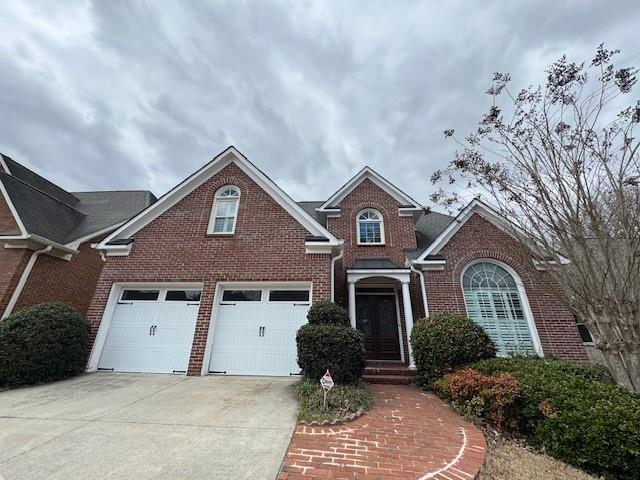 Wonderful home on a beautiful water lot in East Cobb. Walton High School. Terrace level has kitchen, rec room, bath. Home has all hardwood floors. It's really a beautiful home! Never any pets or smokers. Master on main.