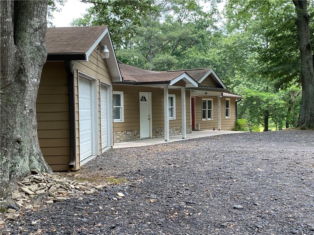 Calling all investors.
This home would make a great investment property.
This 3 bedroom 2.5 bath ranch, has updated bathrooms and kitchen, and a 4 car detached garage. The home sits on a very quiet dead-end road. Great location!
10 mins from downtown Woodstock, I-575, and the outlet mall.
HOME IS SOLD AS IS.