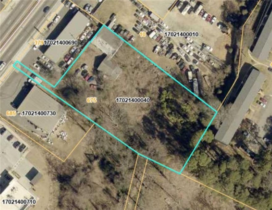 1.1 Acres Just 2 Miles from Marietta Square!

675 Powder Springs Street offers a rare redevelopment opportunity in the heart of Historic Marietta. Just two miles from the Marietta Square and positioned along a high-visibility corridor, this 1.1-acre site is perfectly suited for investors and developers seeking a prime location.

The property currently features a 40' x 50' three-bay garage and a separate office building with reception, three offices, a large workroom, kitchen, one full bath, and one half bath. Both the Garage and office are in need of rehab. The rear portion of the property remains undeveloped, providing flexibility for expansion, new construction, or a complete reimagining of the site.

Large parcels this close to Marietta Square are increasingly rare—don’t miss your chance to secure a property with exceptional visibility and future potential. Sold as-is with no disclosures. Please contact the listing agent before visiting.