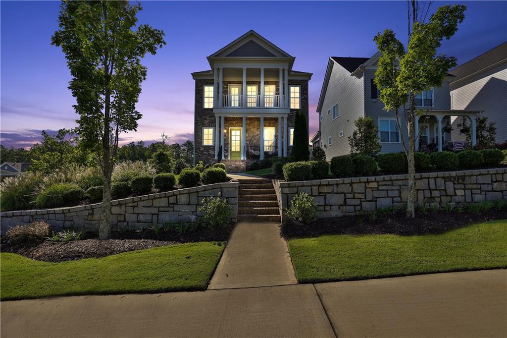 LESS THAN 1 MINUTE FROM AVALON! Welcome to 545 Hanlon Way, a charming 4-bedroom, 4-bathroom home in the heart of Alpharetta, offering an unparalleled lifestyle and prime location. This beautifully designed residence is minutes away from Avalon, with two spacious decks and a welcoming front porch, perfect for enjoying the stunning views of this vibrant area. Nestled on the most coveted lot in the community, this home offers breathtaking views of Avalon and easy access to all the amenities that make Alpharetta one of the most desirable places to live.
Located just over a mile from "The Gathering," a highly anticipated $1 billion mixed-use project currently under construction, you'll be at the center of future shopping, dining, and entertainment venues. The convenience doesn't stop there—this home is also close to GA-400, Wills Park, Downtown Alpharetta, the Alpha Loop, and is situated in the highly sought-after Milton School District. Living here means you'll be at the heart of everything Alpharetta has to offer.
As you step into the main level, you'll be greeted by a welcoming foyer area, leading to a guest bedroom and full bath—perfect for visitors or a home office. The terrace level offers versatile space that can be transformed into a media room, a fifth bedroom or in-law suite, and much more. The main floor features an open-concept design, seamlessly connecting the living room, kitchen, eat-in area, and dining room. Enjoy your morning coffee or evening cocktails on the back patio, which offers scenic views of Avalon and the community.
Upstairs, you'll find a loft with amazing views toward Avalon, perfect for an office or playroom, along with the primary suite, which boasts a dreamy bathroom and two spacious closets. Two additional bedrooms, another full bathroom, and a convenient laundry room complete this level.
With move-in ready conditions, 10-foot ceilings, and hardwood floors, this home is the perfect blend of modern luxury and convenience.