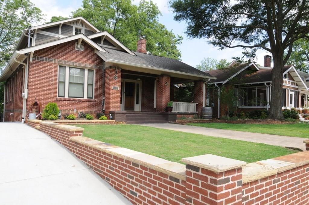 This is Virginia Highlands at its finest. All the things you would expect in a Craftsman but so much more as each element and modification has been thoughtfully designed. Custom woodwork throughout and lovingly maintained. Newly turfed low maintenance front yard, covered stone L-shaped front porch, welcoming living room and open concept dining room with 2 bedrooms and 1 bathroom on the main level plus a den or home office, hardwoods throughout, open kitchen w/ stainless appliances + built in storage/pantry space, surprising 2 story den/family room off the back of the home w/ expansive floor to ceiling windows, 2nd story addition w/ 2 bedrooms, additional living room/den and well designed travertine bathroom. Wrap around deck off the back and yard plus screened in porch just off the kitchen. Walk to Osteria, Harry & Sons, Paulo's, Murphy's, La Tavola, Ocean Wave, and all of VA Highlands most popular shops, pubs, and restaurants, clothing boutiques, & book stores.