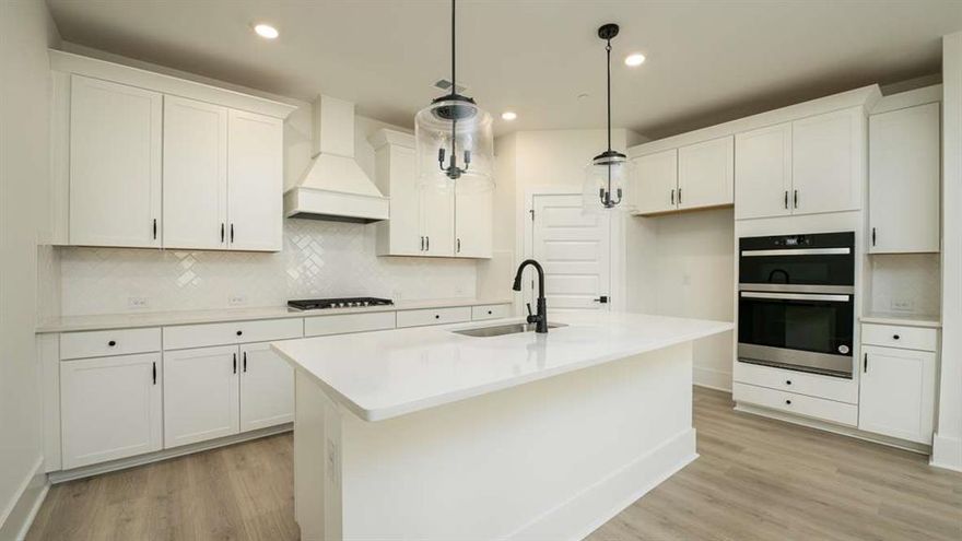 This stunning Harbor floorplan in East Cobb's newest gated community, Village at Sandy Plains, showcases a perfect blend of modern style and functionality. The open-concept plan offers 5 bedrooms and 4 baths in a layout ideal for entertaining. A spacious gourmet kitchen featuring sleek quartz countertops, a vented wood hood, stainless steel appliances, and a large island that flows seamlessly into the dining and living areas. The main living space on the first floor boasts 9-foot ceilings, finished with durable RevWood flooring that flows to wood stairs with an open railing. Upstairs, you'll find a versatile loft that's perfect for additional living or working needs. The oversized primary bedroom provides ample space for a sitting area retreat, while the secondary bedrooms are thoughtfully placed on the opposite side of the home for privacy, with a convenient Jack-and-Jill bath. Elevated finishes throughout the home, craftsman details on the exteriors and a gated swim community make this home a must see. Located in a prime Marietta location, this property offers easy access to the Marietta Square, top-rated schools, shopping, dining, and major highways. It's a truly extraordinary place to call home.