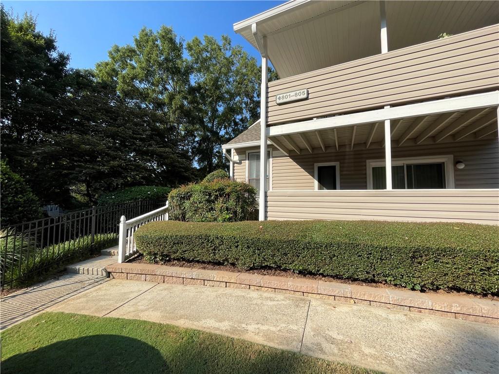 Available late Sept/early October. Spacious 2 bedroom 1 bath condo unit, open living area w/ built-in bookcase, decorative fireplace, dining room w/ passthrough window, kitchen w/ SS appliances, pantry, laundry room w/ W/D included, new carpet in bedrooms, oversized master w/ walk-in closet, large private covered patio, water, sewer, garbage & landscaping included. Easy access to I-75, The Battery Atlanta and centrally located to schools, dining, shopping and more. Photos show condition prior to completion of improvements. This home is AS-IS. Price and/or availability date may change without notice. Rate advertised is for on-time payment. One-time non-refundable move-in fee due prior to lease commencement. Application fee is non-refundable $65 per adult over 18 years of age. Pets accepted on a case-by-case basis. Lease term is a minimum of 12 months. The management company processes all paperwork.