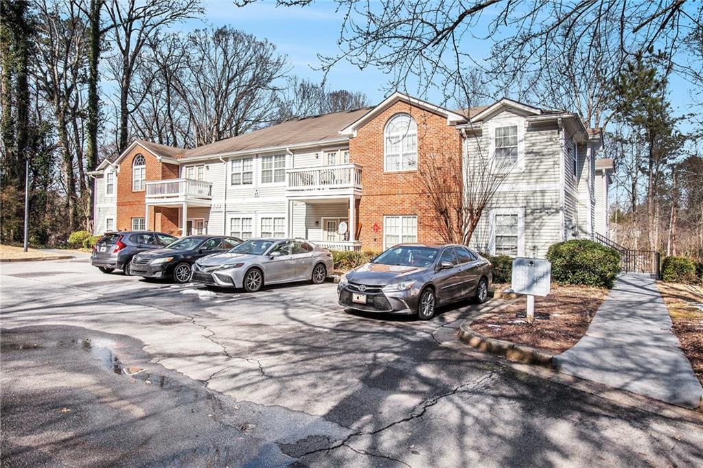 Welcome to 4008 Orchard Hill Terrace, a renovated condo that proves big style really does come in smart packages. Step inside and be greeted by massive high ceilings that make this 2 bedroom, 2 bath home feel anything but ordinary. The open living and dining area flows seamlessly, complete with hardwood floors and a cozy fireplace that practically begs for movie nights or lazy Sundays. The kitchen is updated and ready to keep up with you—featuring sleek countertops, plenty of cabinet space, and all the appliances you need to cook like a pro (or just reheat takeout in style). The primary suite is a true retreat with a generous walk-in closet, while the second bedroom doubles as the perfect guest room, office, or whatever space your life demands. Practical perks include a separate laundry room and central heating and air. All this in a well-kept community that’s minutes from Stone Mountain Park, Dekalb Farmers Market, Emory, CDC, and with easy access to I-20, I-285, and I-85. Add MARTA and the airport to the mix, and you’ll wonder how you ever lived anywhere else. Affordable, updated, and move-in ready!