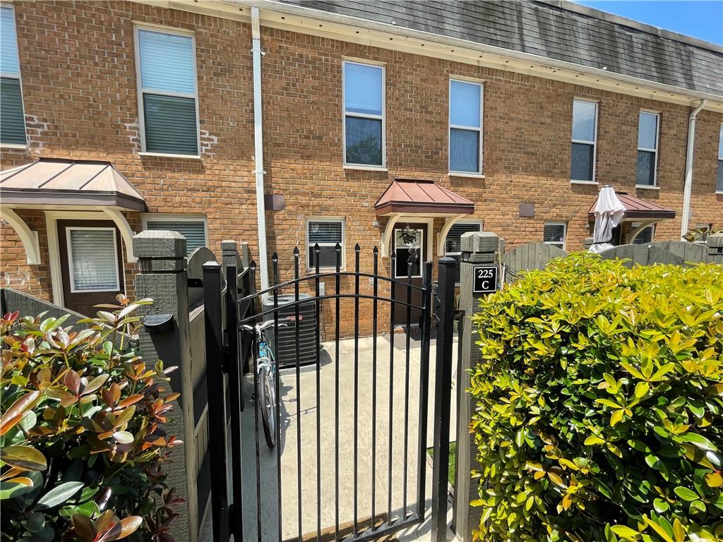 Beautiful gated community townhome in a very convenient location! Only minutes to Historic Roswell, Chattahoochee River Park, and Morgan Falls Overlook Park with easy access to GA400 & MARTA. This gorgeous unit is just steps to the refreshing community pool! This home boasts a large open floor plan w/ 2 master suites with spacious walk in closets. There is also a beautiful guest powder room on the main floor. The kitchen is tastefully updated with all stainless steel appliances, granite countertops, and modern cabinets for ample storage. The main floor is open concept and has been updated with a feature wall and engineered hardwood floors. The outside features a private patio with a back gate and two designated parking spaces. This is a lovely well kept community with many amenities for you to enjoy. Available August 1st.