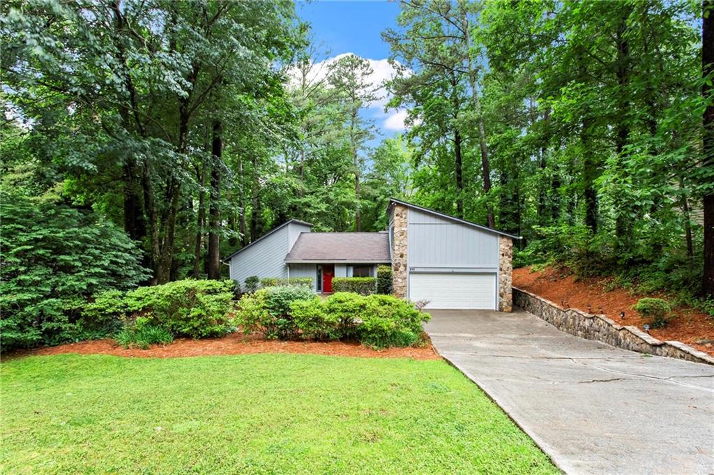 Welcome to this stunning contemporary ranch home nestled in a serene cul-de-sac in the highly sought-after Indian Hills Country Club. This spacious residence features a seamless main-level layout with no steps, making it perfect for easy living. Boasting 4 bedrooms and 3 full baths, this home offers an expansive open floor plan filled with natural light, thanks to double-pane windows in every room. The inviting vaulted ceiling enhances the charm of the large living rooms and master retreat. The master is conveniently located on the main level on the left side of the home. On the right side of the main level, you'll find two generously sized guest rooms, along with an additional large bedroom and full bath above the garage, providing ample space for guests.
The centrally located kitchen on the main level,opens up to a double-story family room, complete with a beautiful stone gas fireplace, creating a warm and inviting atmosphere for gatherings. The spacious dining room accommodates 6-8 people comfortably, perfect for entertaining.
Step outside to enjoy the wonderful backyard patio, ideal for relaxing or hosting outdoor get-togethers. Additional features include a big laundry room and a two-car garage with plenty of storage space. This home is surrounded by lush greenery and tranquility.
You can appreciate the excellent schools in the area, including East Side Elementary, Dickerson Middle, and Walton High School. Don't miss this exceptional opportunity to make this gorgeous home your own!