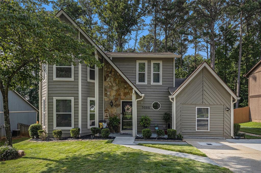Spacious and Well-Maintained Home in Sought-After Stone Mountain Neighborhood!
Welcome to this beautifully landscaped 3-bedroom, 2.5-bath home offering comfort, flexibility, and charm. Located in a quiet, established community, this home features laminate floors throughout the main living areas and bedrooms, with carpet in the flex room and tile/vinyl in the kitchen, laundry, and bathrooms.
Upstairs, you’ll find three spacious bedrooms and two full baths. The main level includes a separate living room and dining room, a cozy flex/den space (converted from the original garage and fitted for central heat and air to be installed, if desired), a powder room, and an inviting eat-in kitchen with stainless steel appliances and custom cabinets.
Step directly from the kitchen onto a private backyard patio—ideal for relaxing or entertaining. Privacy fence around the front sides and back of the home. Backyard features a storage shed, and a sprinkler system (that serves both the front and back yards), complementing the plush “zoysia” grass and landscaping.
Parking is available in the driveway and the extended driveway on the side of the home—perfect for multiple vehicles. This home is move-in ready and offers everything you need for comfortable and stylish living!