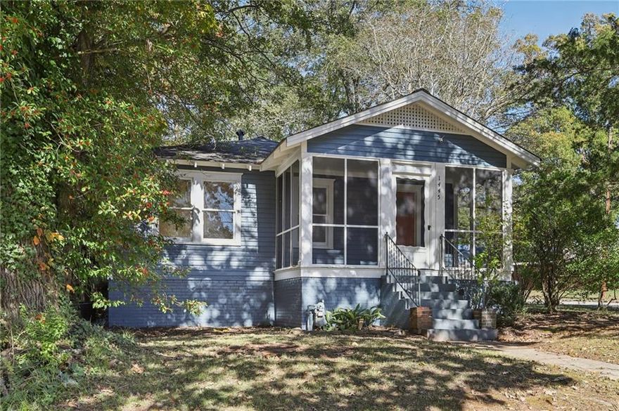 Welcome to this charming home on a large corner lot in a quiet Atlanta neighborhood. Tucked away in quaint Colonial Hills, from the moment you walk in, you’ll notice how much natural light fills every room. This is no cookie cutter new-build- the home’s original details and craftsmanship have been lovingly maintained by the owner. The layout offers plenty of room to relax or entertain. The kitchen and dining areas flow together making everyday life simple and hosting your loved ones both easy and convenient. Throughout the home, you’ll find classic touches—like hardwood floors, trim work, and built-ins—that give it warmth and personality. Two large bedrooms with ample closet space and two recently renovated bathrooms top off this wonderful home. 

Outside, the spacious corner lot provides lots of potential for gardening, playing, or gathering, with extra space and privacy to enjoy.

You’ll love the location—just minutes from local restaurants, shops, and parks, and a short drive to the Lee + White development in West End, offering breweries and lots of dining options. With easy access to downtown and major highways, this home combines historic charm, great light, and a convenient location.
If you’re looking for a well-kept home with character and room to grow, 1445 Saint Michael Avenue is ready for you.