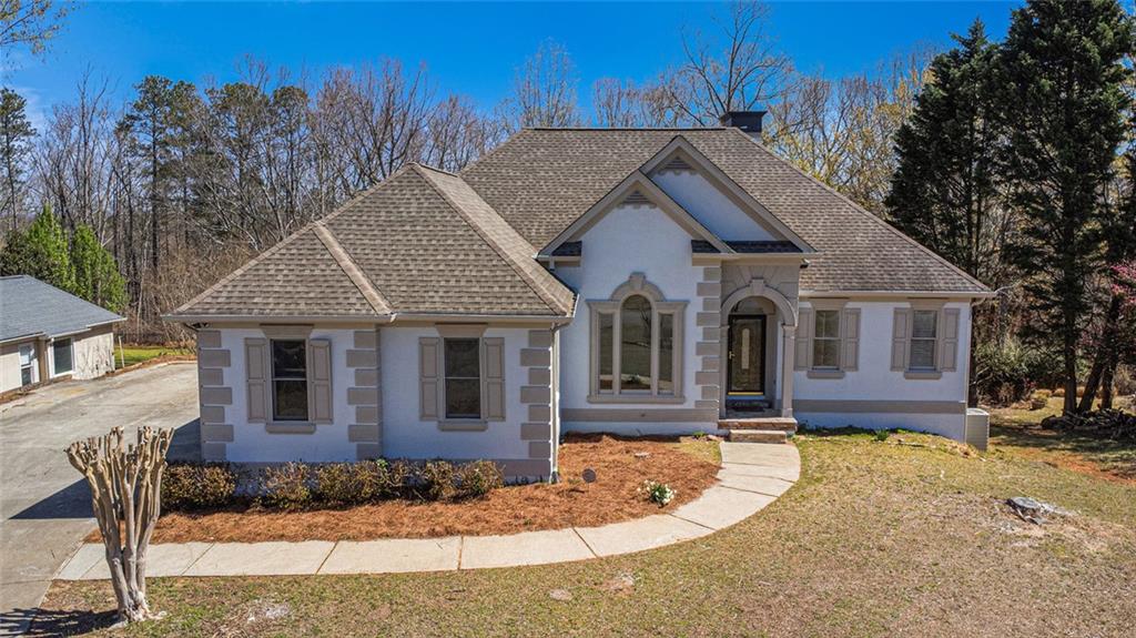 7025 Bavarian Wood Place, Buford, Georgia image 1