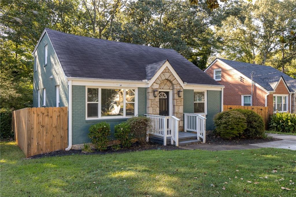 Come check out this well-cared for extra-large 3 bedroom 2 bath East Lake Terrace cottage with detached office ADU and hardwood floors throughout! A stone's through to East Lake Golf Club, this spacious floor plan is perfect for a variety of uses with 2 br/1 ba on main floor and the primary 1/1 master suite on entire second floor with his and hers walk-in closets. Kitchen is spacious and boasts a granite counter space peninsula to please any at-home chef. But it's what's outside that is equally impressive: The private massive deck overlooks a giant level yard with a fire pit! There is also bonus living space with the detached 14 ft x 10 ft outbuilding setup with electric and AC perfect for a home office, gym, art studio, or workshop! If you are looking for serenity, flexible use options, and spaces to host or entertain - this is the home you want to come see today!