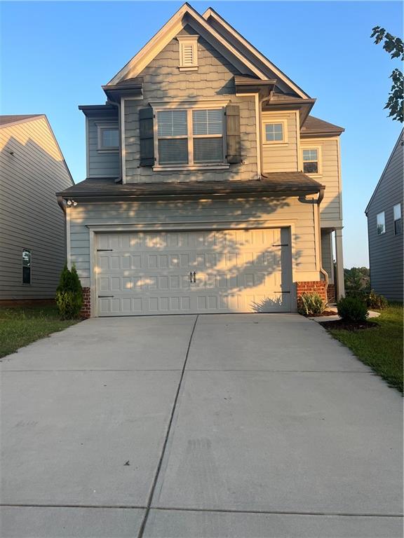 Gorgeous 3 Bedroom and 2.5 bath home- Move in ready!!! Open floor plan with eat in kitchen overlooking the large living room. The kitchen features a large island and stainless steel appliances. The master bedroom has a large walk in closet, oversized bathroom with double sinks and separate tub and shower. The two additional bedrooms with walk in closets and bathroom round out the upstairs. The backyard is fenced and level. This adorable home won't last long!!