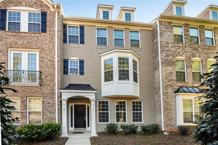 Never have to worry about missing out when you live here! What a great location for Avalon, Alpharetta, The Loop, Big Creek Greenway, Ameris Bank Ampitheater, Shopping, Dining, and easy commutes on GA400. Open and Bright best describe the feel in this home, beautiful hardwood flooring throughout the terrace level and main floor, loads of natural light and open concept living. Entertaining is a breeze with the open feel of the main level, with the breakfast bar for a quick meal or buffets for your guests. Family room, living room and kitchen easily flow for quality family time or room for a crowd, chilling on the deck is convenient just off the kitchen breakfast room. Upstairs offers new carpeting, spacious primary suite, updated primary bath & customized walk-in closet. Two additional bedrooms, for guests or 'work at home' office, and secondary bath with an oversized vanity. All this with award winning schools and neighborhood recreation amenities, Welcome Home!