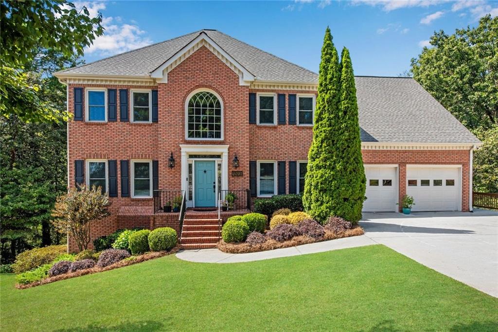 Welcome to this spacious brick home nestled on a cul-de-sac lot in Walkers Ridge North, a delightful swim and tennis community in the heart of West Cobb with a 2-car garage, fenced-in backyard, & full unfinished basement! This immaculate home blends functionality & space seamlessly. The curb appeal shows off a grassy front yard, landscaping, & shade tree. As you enter through the front door, you are greeted by a 2-story foyer w/ lantern chandelier, hardwood floors, & an open living room that is great for a home office. The formal dining room to your right connects to the large kitchen featuring wood cabinetry, sleek SS appliances, granite countertops, an RO water filtration system, & kitchen peninsula showcasing tongue & groove backing w/ overhang for bar seating! Bay windows surround the spacious breakfast area creating a light-filled retreat w/ views of the backyard! The kitchen flows into the open family room that is anchored by a brick fireplace & floating wood shelves making it the perfect place to gather. Exterior door leads directly out to the back deck & covered back porch great for entertaining with backyard views! Through the kitchen, uncover a fabulous mudroom area at garage entrance, the main floor half bath, a generous Pinterest worthy walk-in pantry, & a large updated laundry room w/ sink, folding surface, storage cabinets, & built-in clothing rack! Back staircase leads up to a fantastic bonus room which could become a 5th bedroom or use it as a playroom, home office, media room, or anything else to suit your needs! Make your way down the hall to discover the oversized primary bedroom featuring tray ceiling w/ new fan, sitting area by the windows, & massive walk-in closet! Luxurious remodeled primary bathroom has a subway tiled shower w/ frameless glass door, clawfoot soaking tub placed in front of the picture window, dual vanity w/ make-up area, new lighting, tiled floors, & private water closet! Also located upstairs are 3 additional perfectly placed bedrooms & a spacious updated full bathroom w/ double vanity, new hardware, new sink faucets, & new lighting. From the family room, make your way down to the full unfinished basement that has a workshop area, multiple rooms, & 2 exterior doors. This space is great for storage now or you have tons of options in future to finish to your liking. Head outside to the totally fenced-in low maintenance backyard that has a level grassy area, lush landscaping, & a wall of trees that make it completely private! Additional upgrades include new carpet in the FR, entire interior of home has been recently painted, New R38 insulation in the attic, & tons of new windows throughout! The neighborhood amenities include a swimming pool, tennis/pickleball courts, basketball goal, plenty of parking, a little free library, and it is situated in a top-rated school district! West Cobb offers tons of shopping & dining on Barrett Parkway & Dallas Highway and is located only minutes away from West Cobb Avenues, Kennesaw Mountain hiking trails, & the Marietta Square making it the ideal place to be!