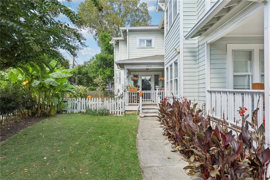 A Candler Park gem where character meets convenience. Minutes from Marta, Inman Park, Little Five Points and the BeltLine, this 3-bedroom, 2.5-bath home blends timeless charm with modern versatility. Located in a top-performing school district, this home gives you a little bit of everything for making the most of Atlanta living. Step inside to find a spacious layout, with all three bedrooms situated upstairs for added privacy. Just
off the 2 car garage, you’ll discover a large bonus room with a half bath and shower stub, making it an ideal in-law suite, private office or content creation studio. Outdoor living shines here with a small fenced front yard featuring a stone walkway and thriving blueberry, blackberry,
and raspberry plants. The larger side and backyard include a fig tree and space for your own vegetable or flower gardens, giving you room
to enjoy nature without leaving home. This home truly offers the best of both worlds—an urban retreat that balances connection and calm.