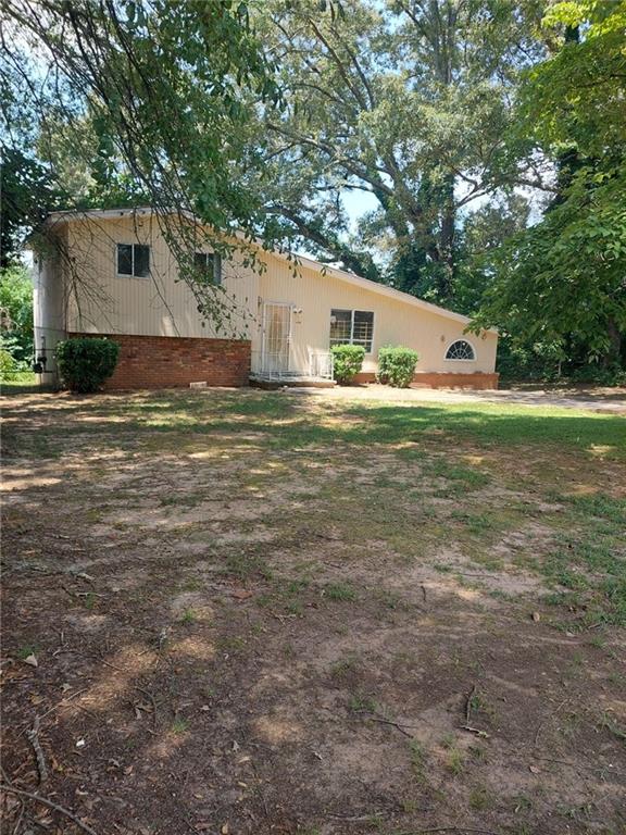 Investor special in the Normandy community of Clayton County! This 4-bedroom, 2-bath split-level offers a large eat-in kitchen, flex space, and strong potential for value-add renovations. With cosmetic updates, this property can deliver excellent ROI through resale or steady rental income in a high-demand area. Convenient access to schools, shopping, and major highways makes it an attractive option for future tenants or buyers. Perfect opportunity for an investor or homeowner looking to customize and bring this home back to life. Don’t miss this opportunity to maximize returns in Clayton County!