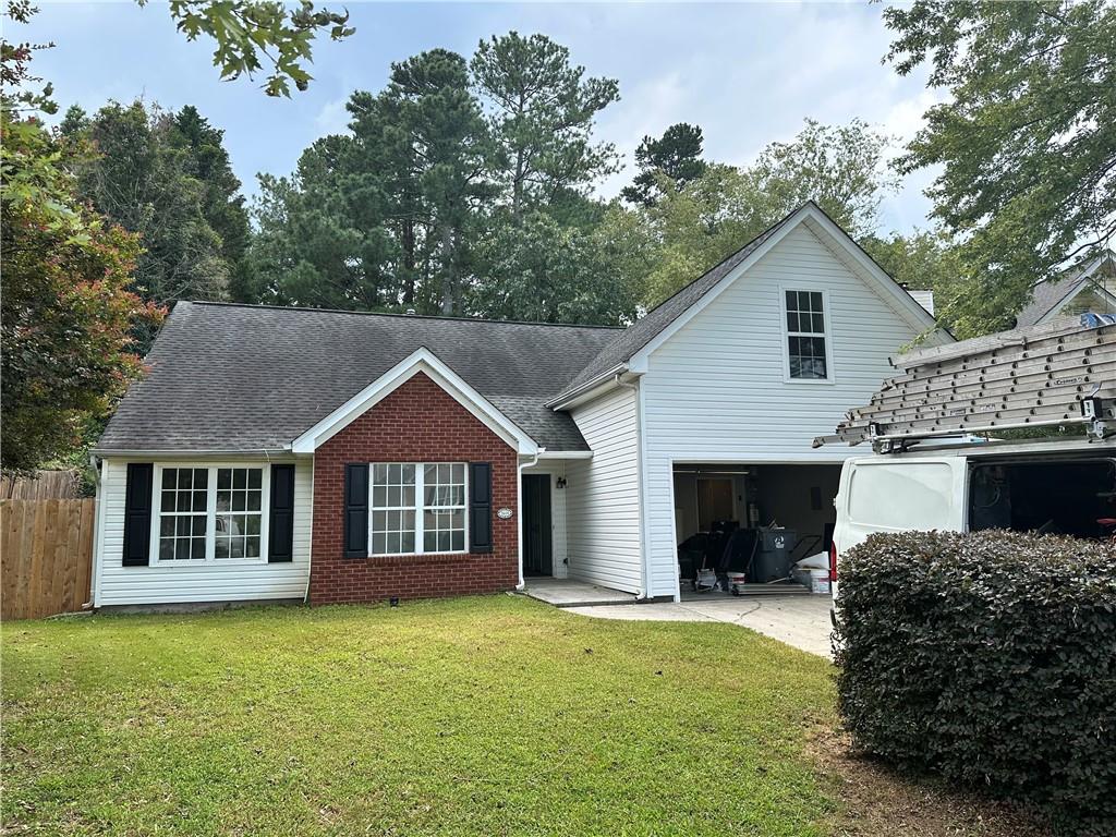 this beautifully Renovated 4-bedroom, 2-bathroom home offers the perfect blend of layout, location, and lifestyle. With three bedrooms on the main level — including a spacious primary suite — and a large private bedroom upstairs, this home is ideal for multi-generational living, guests, or a flexible work-from-home setup. The main floor features New hard wood throughout the house with fresh paint, open-concept living room with vaulted ceilings and abundant natural light, seamlessly connected to a spacious new update-kitchen with New appliances. The primary suite on main boasts a New-double vanity, separate shower, and a walk-in closet. Two additional main-level bedrooms share a full bath, offering both comfort and convenience. Upstairs, you'll find a large bonus bedroom perfect for a teen suite, media room, or office. Great location Minutes from shopping and entertainment. near to the rock spring park and coolray field.5 minutes from mall of GA and collins hill park.