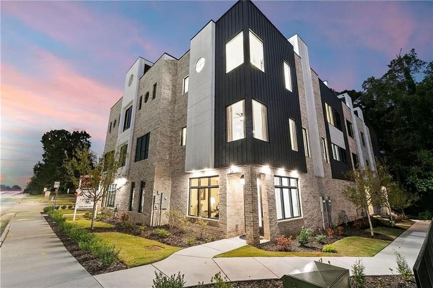 Turn off 8th Street and glide through the motor court into your private two-car garage, the beginning of something special. Inside, the first floor welcomes you with a bright, modern foyer, a full bath, and a spacious bedroom that doubles beautifully as a home office, complete with two closets for effortless organization. Ascend to the open concept main level where luxury meets design. The kitchen is a showstopper featuring one-of-a-kind marble countertops, two-tone cabinetry, a generous island for entertaining, walk-in pantry, and a sleek dry bar with a built-in wine fridge. Fulgor stainless steel appliances anchor the space, complemented by designer lighting and hardwood floors that flow seamlessly throughout. The dining area sets the stage for your first dinner party, while the elevated living room framed by corner windows offers striking views of the PDK runways below. A discreet half bath adds an extra layer of convenience for guests, and a large walk-in storage closet near the staircase ensures everything you need has a stylish place to stay tucked away. On the third level, the indulgence continues with an ensuite secondary bedroom, hallway laundry, and an elegant primary suite boasting dual walk-in closets with custom shelving and a spa-like bath featuring a double vanity, water closet, and oversized walk-in shower. And just when you think you’ve seen it all, the rooftop terrace steals the show. Stretching the full length of the home, it is finished in lush turf with panoramic views of Stone Mountain and the runway lights of Peachtree-DeKalb Airport. Perfect for sunset cocktails or midnight conversations, a gas line awaits your custom outdoor kitchen upgrade. Beyond the home, The Foxtrot offers an enviable lifestyle designed for those who move to their own rhythm. Surrounded by six parks and the sprawling 33-acre Ashford Park Reserve, outdoor adventures are steps away. Minutes from Emory University, top hospitals, major highways, and an array of dining and entertainment options, you’ll enjoy the best of urban living with the ease of a connected community. Experience luxury living at its finest at The Foxtrot, where prime location, exceptional craftsmanship, and unparalleled design converge to create a lifestyle unlike any other. At The Globemaster, every landing feels like a grand arrival.