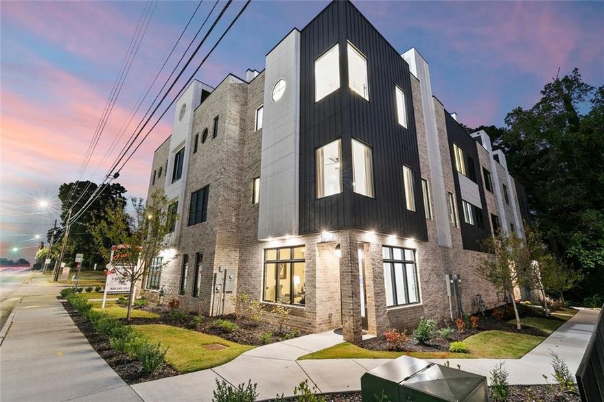 Turn off 8th Street and glide through the motor court into your private two-car garage, the beginning of something special. Inside, the first floor welcomes you with a bright, modern foyer, a full bath, and a spacious bedroom that doubles beautifully as a home office, complete with two closets for effortless organization. Ascend to the open concept main level where luxury meets design. The kitchen is a showstopper featuring one-of-a-kind marble countertops, two-tone cabinetry, a generous island for entertaining, walk-in pantry, and a sleek dry bar with a built-in wine fridge. Fulgor stainless steel appliances anchor the space, complemented by designer lighting and hardwood floors that flow seamlessly throughout. The dining area sets the stage for your first dinner party, while the elevated living room framed by corner windows offers striking views of the PDK runways below. A discreet half bath adds an extra layer of convenience for guests, and a large walk-in storage closet near the staircase ensures everything you need has a stylish place to stay tucked away. On the third level, the indulgence continues with an ensuite secondary bedroom, hallway laundry, and an elegant primary suite boasting dual walk-in closets with custom shelving and a spa-like bath featuring a double vanity, water closet, and oversized walk-in shower. And just when you think you’ve seen it all, the rooftop terrace steals the show. Stretching the full length of the home, it is finished in lush turf with panoramic views of Stone Mountain and the runway lights of Peachtree-DeKalb Airport. Perfect for sunset cocktails or midnight conversations, a gas line awaits your custom outdoor kitchen upgrade. Beyond the home, The Foxtrot offers an enviable lifestyle designed for those who move to their own rhythm. Surrounded by six parks and the sprawling 33-acre Ashford Park Reserve, outdoor adventures are steps away. Minutes from Emory University, top hospitals, major highways, and an array of dining and entertainment options, you’ll enjoy the best of urban living with the ease of a connected community. Experience luxury living at its finest at The Foxtrot, where prime location, exceptional craftsmanship, and unparalleled design converge to create a lifestyle unlike any other. At The Globemaster, every landing feels like a grand arrival.