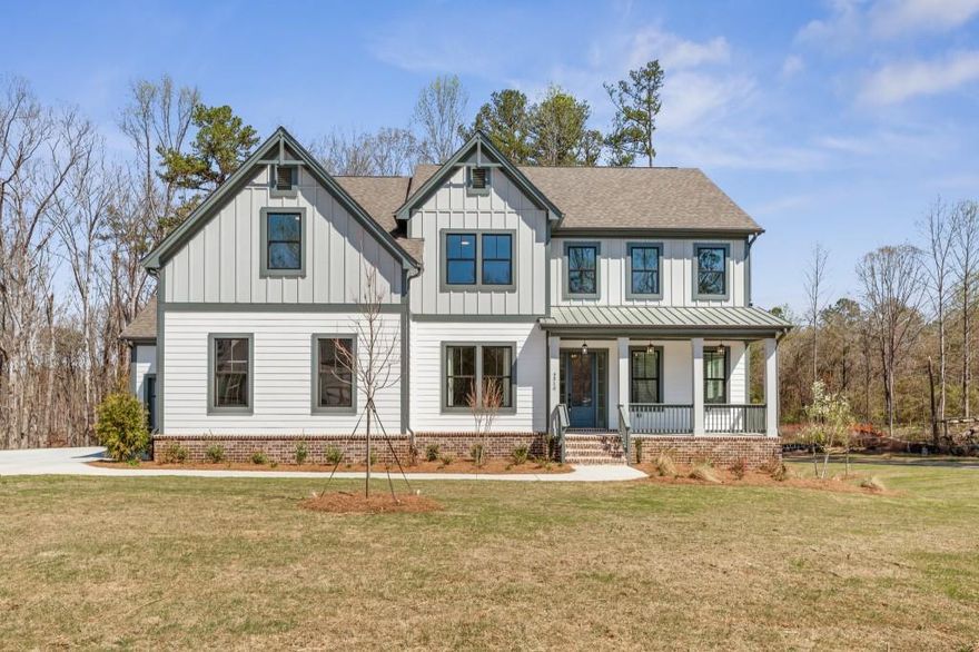 The Bellville Plan by Peachtree Residential. Our official model home! Quick Move-in! This luxurious basement estate is outfitted with all the most beautiful design features - no detail has been spared. You won't want to miss this! Welcomed in by an expansive foyer, on either side you will find a formal dining room big enough for those holiday dinners and a private in-law suite w/ wet bar perfect for guests. Continuing into the home, a towering 2-story family room w/ brick surround fireplace is supplied with vibrant natural light from the huge wall of windows. The family room is overlooked by a sparkling chef's paradise kitchen with wall oven, gas cooktop & vent hood, and gorgeous interior design selections/fixtures. Upstairs your private retreat awaits. The large owner's suite is decked out in the highest fashion with beamed ceiling leading to a spa-like bathroom w/ tile shower & garden tub, make-up counter, chic framed mirrors, and an extensive walk in closet. Rounding out the second level you will find 3 additional spacious bedrooms and 2 bathrooms. Out back is a cozy grilling deck waiting for you to cook up those seasonal meals and enjoy your coffee with the sunrise. All of this on an enormous corner lot w/ a basement makes it THE perfect home. Call TODAY! Ask about our AMAZING incentive with use of preferred lender and binding contract by 10/31/2025 and close by the end of 2025!