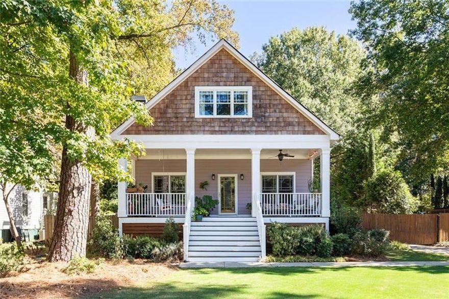 From sunlit mornings on the front porch to cozy evenings by the fireplace, this home effortlessly blends comfort, style, and everyday luxury. Freshly painted interiors and newly refinished hardwood floors set the stage for bright, inviting living throughout. Manicured landscaping and a welcoming front porch create the perfect spot for morning coffee or unwinding at the end of the day. Inside, the layout flows with intention, balancing open gathering spaces with tucked-away corners to recharge. Hardwood floors, coffered ceilings, and custom built-ins add warmth and character, while modern updates keep life seamless. The oversized living room, anchored by a fireplace and custom shelving, opens to a sunlit dining area and chef-ready kitchen with refinished cabinetry and stainless appliances—a space designed for entertaining or quiet family moments. Just off the living room, a versatile flex space adapts to your lifestyle, whether a home office, guest room, or creative retreat. The elevated primary suite is a serene escape with a fully updated bath featuring designer tile, walk-in rain shower, and spa-inspired finishes. Another main-level bedroom and refreshed hall bath provide comfort and flexibility for guests. Upstairs, a thoughtful renovation creates room for everyone to thrive. A large bonus room with built-in shelving offers endless possibilities for a recreation area, home theater, or studio. Enjoy an additional bedroom, full bathroom and a huge great room that provides additional space for kids or guests. French doors open to the backyard, turning outdoor living into everyday luxury. A large deck invites weekend cookouts, the fenced yard is ideal for pets and play, and the landscaping sets the scene for cozy nights around a fire pit. The detached two-car garage features a lofted storage area with potential for a home gym, art studio, or hangout loft that grows with you. A remote-controlled gate adds convenience and security. With Kirkwood neighborhood favorites just blocks away and easy access to I-20, this home balances effortless intown living with modern comfort, ready for every chapter of your life.