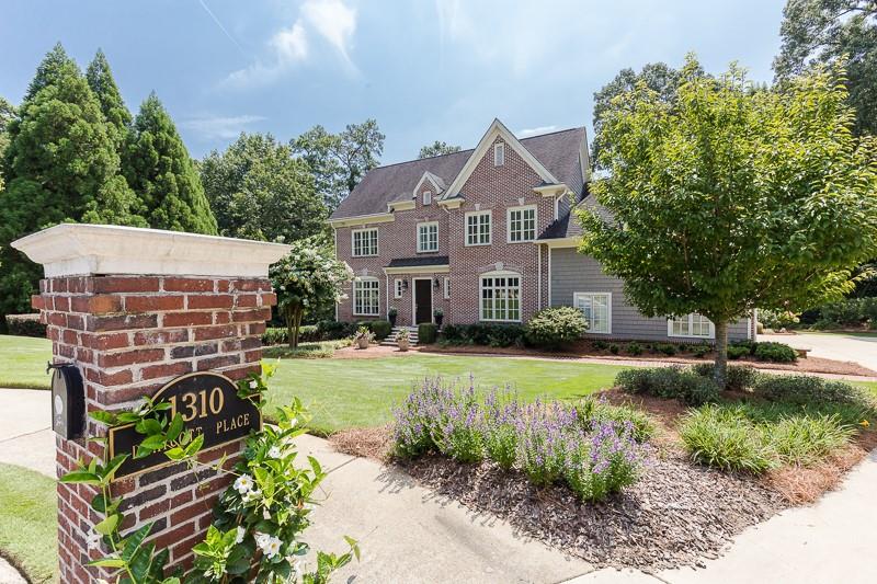 Stunning renovation in one of Atlanta's finest locations! Chef's kitchen is the envy of all cooks, and the laundry room is so beautiful, you may never want to leave! Master is on the main with sitting room, and a bath renovation that is equally gorgeous-sleek, crisp, current! The secondary baths are also completed to perfection-you can just move right in! Freshly painted, new windows, soaring ceilings, open floorplan, amazing finished basement, outdoor covered porch overlooking flat backyard and pool, this home is perfect for your family!