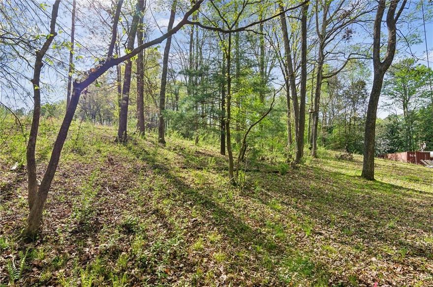 Fantastic opportunity on over 5 amazing acres that sit up off Hopewell Road. Build your custom estate lot featuring 1-3 homes, or build your true family compound. See the conceptual site plan which can be modified to your family or builder's specific needs. Land has been tested with level 3 soils without any issues. All perc tests and soil reports available upon request. No access to existing home without bound contract.
Price increased to reflect development underway.