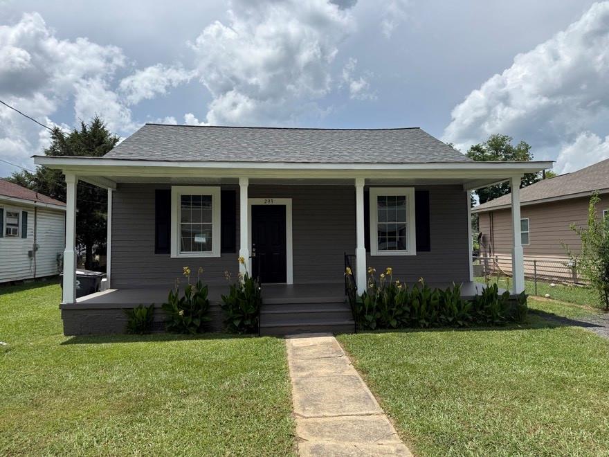 This adorable 2 bedroom, 1 bath bungalow is move-in ready for you! Brand new roof, freshly painted interior and exterior, some new flooring, and more make this an ideal home for any homeowner! Qualifies for 100% financing as well as additional money toward closing cost if using preferred lender.