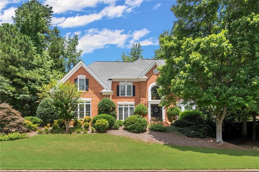 Welcome to Your Hidden Gem in Alpharetta/Johns Creek!

Nestled in one of the most sought-after areas, this timeless 4-sided brick traditional home is ready for your personal touch. The main level features gleaming hardwood floors, a full bedroom and bath, formal living and dining rooms, and a spacious family room with elegant built-in bookcases. The light-filled kitchen opens to a cozy breakfast room and a sunroom—ideal for morning coffee or afternoon relaxing.

Upstairs, the oversized primary suite boasts a private bath, while three additional bedrooms offer generous space and ample storage. The fully finished terrace level is an entertainer’s dream, complete with rich wood finishes, a full bar, theater area, bonus room (perfect as a guest bedroom), full bath, and a game room.

Step outside to enjoy the large deck, fire pit, and a private backyard perfect for gardening, play, or outdoor entertaining. All of this comes with resort-style amenities: pool, tennis courts, playground, lake, and more!

Close to top-rated schools, parks, and shopping—this is your opportunity to create the home of your dreams in an unbeatable location. Don’t wait—make this one yours today!