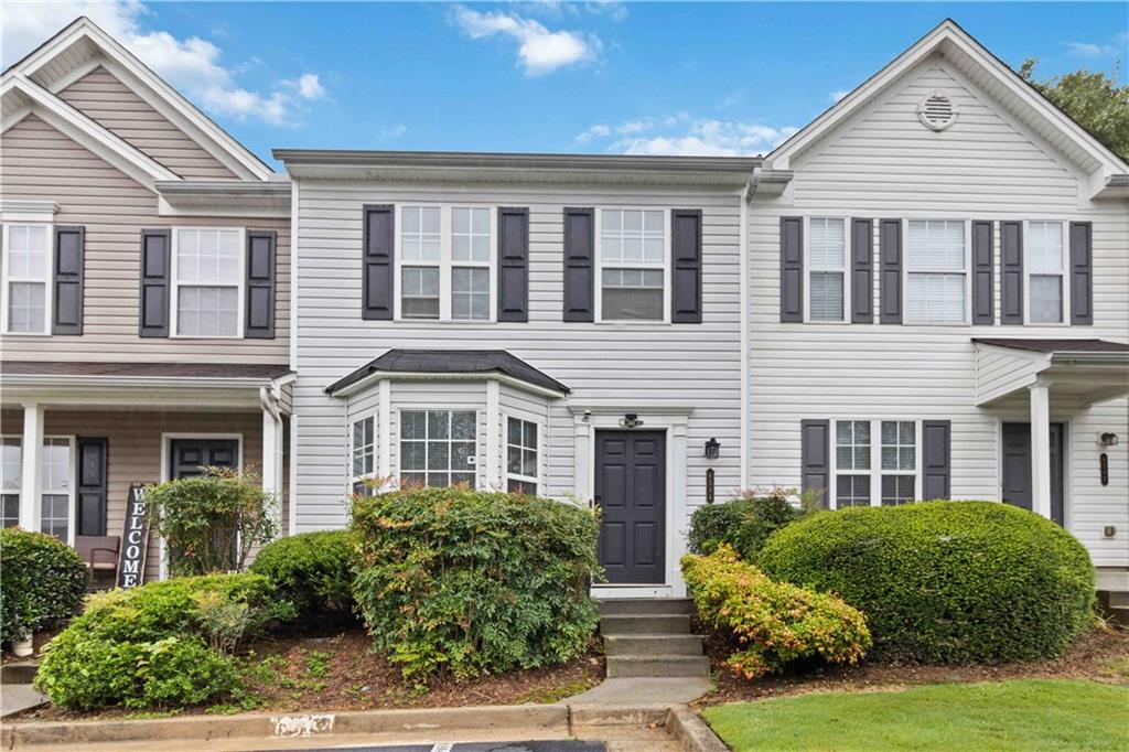 Tucked away in a quiet, well-maintained gated community, this charming townhome offers the perfect blend of peaceful living and modern comfort. Step inside to an open-concept layout that flows effortlessly from the spacious living area to a dedicated dining space—perfect for casual breakfasts or cozy dinners. The kitchen features stainless steel appliances with a warranty, ample cabinetry, and a layout ideal for both everyday living and entertaining. Just off the main level, enjoy your covered patio, a lovely spot for morning coffee or unwinding in the evening. Upstairs, a loft area provides a flexible space for a home office or reading nook, while the spacious bedrooms offer plenty of room for guests, a growing family, or creative use. Natural light fills the home, enhancing its inviting warmth throughout.
Conveniently located just minutes from I-285, I-20, the Silver Comet Trail, and plenty of local shopping and dining -- this is low-maintenance living in a community you'll love coming home to. Don’t miss your chance to own in Arbor Gate—a place where comfort meets convenience.