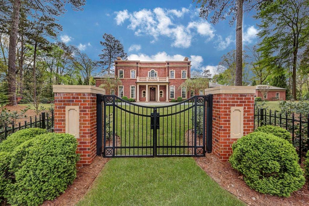 This beautifully built BUCKHEAD, gated estate includes the amenities desired for a contained living experience. With 12 foot ceilings and 8 to 10 foot windows throughout main level natural light is plentiful. Inviting owners suite on main level with sitting area, fireplace, his and her baths, closets and entry to outdoor terrace. Stunning kitchen done by Design Galleria adjacent breakfast/family room opens to covered veranda perfect for outdoor casual dining. Handsome paneled library with secret entrance to owners suite. Banquet sized dining room, gracious living/great room with fireplace, enclosed bar area perfect for entertaining and lovely staircase complete the main level living area. The upper level includes 4 bedrooms with en suite baths, and secret playroom. The terrace level includes a gym, theater, spa, rec area, guest suite, 2 and 1/2 baths and access to pool, entertainment area. Additional amenities include exquisite inlaid hardwood floors, 10 foot ceilings on both upper and terrace levels, elevator to 3 levels , generator,3 laundry rooms with one on each level, 2 gates for entry and exit to property, 6 masonry fireplaces, 4 garages, flat driveway perfect for basketball or other recreational sports and beautiful grassy areas for children’s play. 3 laundry rooms with one on each level.
The home has a slate roof and copper gutters, it truly encompasses the best of the best!