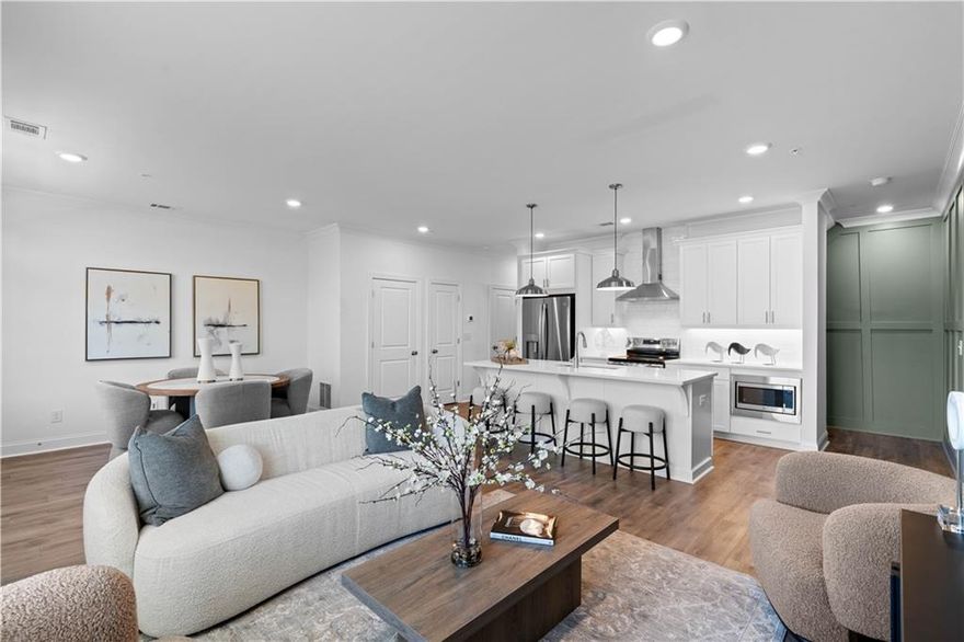 Season of Savings at Market Square! Enjoy an additional $10,000 Towards Closing Costs on the Magnolia Plan by The Providence Group. Estimated Completion: January/February 2026.
Experience elevated living in this thoughtfully crafted 3-story stacked townhome with condominium ownership, offering 2 bedrooms, 2.5 bathrooms, and 1,373 sq. ft. of stylish comfort. Designed with the Warm Linen Collection, this home showcases Calacatta Alto Quartz Countertops and Ryman Flooring for a clean, contemporary feel.
Terrace Level: Step into a welcoming foyer with a conveniently located laundry area and access to a private garage—complete with an Electric Vehicle Charger for modern convenience.
Main Level: Enjoy open-concept living with a spacious family room, dining area, and chef-inspired kitchen featuring 42” White Cabinets and Island, quartz countertops, stainless steel GE appliances, a tile backsplash, and an impressive 8-foot island—perfect for entertaining. Natural light pours in, leading to a covered patio ideal for relaxing mornings or cozy evenings.
Third Level: Unwind in the serene Primary Suite with a walk-in closet and a spa-like bath featuring dual quartz vanities and a walk-in shower with tile surround. A secondary bedroom with its own private bath offers flexibility for guests, a home office, or personal retreat.
Live Where Life Happens.
Located in Forsyth County’s top-ranked school district, Market Square offers future shops and restaurants just steps away, plus walkability to the Cumming City Center—bringing dining, entertainment, and community events right to your doorstep.
[The Magnolia]