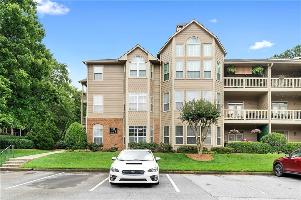 Move-in ready and perfectly positioned in the heart of Atlanta’s Old Fourth Ward, 719 McGill Park Avenue offers a rare opportunity to own a spacious, 2-bedroom, 2-bath corner unit in the sought-after, gated McGill Park community. This light-filled, ground-floor condo features 1,418 square feet of open living space just steps from the community amenities. The inviting living room includes a cozy double-sided fireplace and an additional flex space—ideal for a home office or reading nook.
Both bedrooms are generously sized and offer excellent closet space, making everyday living comfortable and convenient. Tech-savvy buyers will appreciate the unit’s Google Fiber internet, and EV owners will love the on-site electric vehicle charging stations.
Enjoy resort-style living with access to a community pool, fitness center, and lushly landscaped grounds—all within a short walk of Atlanta’s best attractions, including the BeltLine, Ponce City Market, Krog Street Market, parks, and top-tier dining.
Whether you're a first-time homebuyer, downsizer, or investor, this intown gem offers the perfect blend of space, amenities, and unbeatable location.