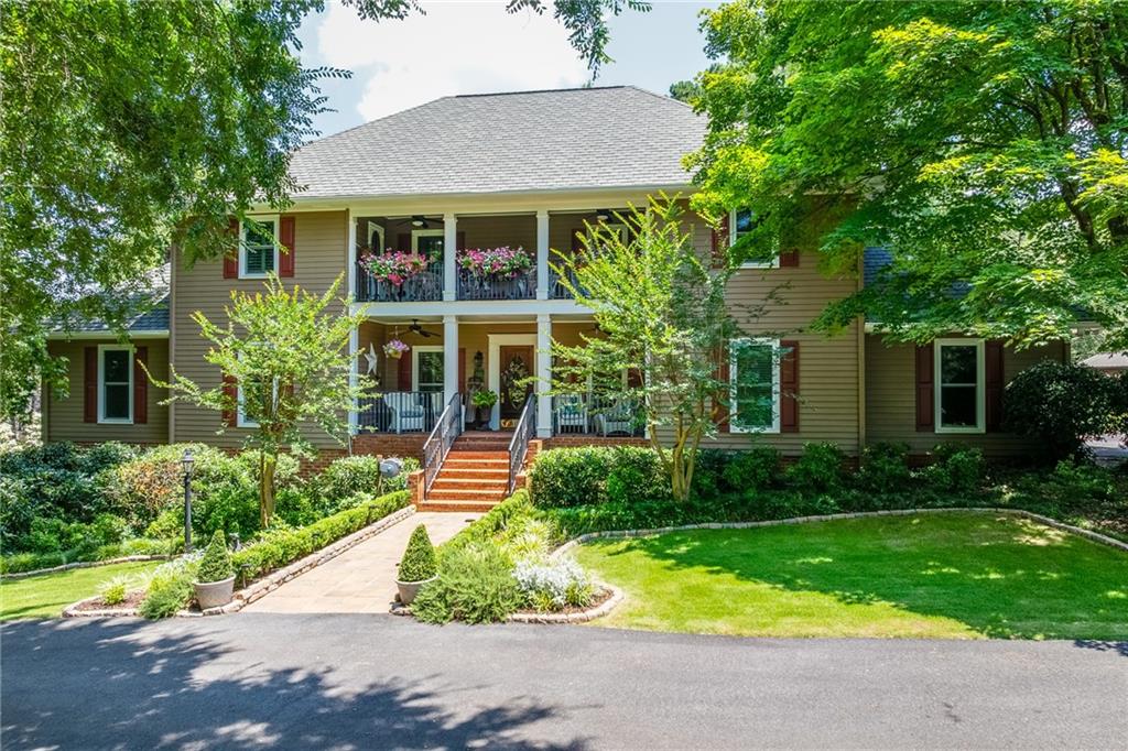 LISTING COMING SOON!! PROFESSIONAL PHOTOS ON THE WAY!! Where do we start? Famed UGA basketball coach, Hugh Durham, lovingly built this home as his personal estate in 1979. The current owner, only the third, painstakingly restored this southern belle to her former glory and it is SIMPLY BREATHTAKING! Located on almost 4 acres and nestled among other estates on large acreage tracts, enter the property off Old Jefferson Rd via a long winding driveway. There is also access along Walton Creek Rd. With AR zoning and no HOA affiliation, it is permissible for a few horses and stables. A circular driveway provides a grand entrance and plenty of parking for guests in addition to the side-entry two-car garage. As a nod to the original owner & UGA, you'll enter the home 'tween the hedges You can't help but notice the opulent landscaping which is fed automatically with a series of sprinklers (all well-fed). But just wait...there's so much more. A wide brick walkway leads you to the double balconied facade into the welcoming grand foyer. Inside, you are welcomed straight into the pages of Southern Living. Wide heart of pine plank flooring gleam and deep custom molding run throughout the home. Formal dining and living rooms flank the foyer. Thoughtful flow leads your guests to the massive great room with a large wood-burning fireplace and deep wood wainscotting. A large wetbar with granite counters, sink, custom built-ins, and refrigerator nook sits adjacent with a serving window. Tucked quietly beyond, is the 1st of two main-level powder rooms. Accessible through the great room, foyer, and dining room, is the kitchen. Brick flooring and accents, high-end appliances marble countertops, and custom built-ins make it a true chef's dream. Beyond, is the 2nd half-bath and large mudroom/laundry room - again with tons of custom built-ins. A wide rear deck runs the length of the home, overlooking the inground pool and gardens...but we'll get to that later. Upstairs, is the owner's suite with more storage and closets, that you'll need to go shopping to fill them. The bath is a spa-like oasis boasting a steam shower, deep soaking tub, and more custom built-ins. Two additional bedrooms and baths round out the second floor which also has those lovely heart pine floors and deep custom built-ins. The upstairs balcony is accessible from either the owner's suite or the front secondary bedroom - a wonderful place to enjoy your first cup of coffee. On the 3rd level, is a giant suite with sitting area, bedroom, and ensuite bath. Back downstairs to the terrace level, you'll find an unbelievable in-law suite. A gourmet kitchen, walk-in pantry, second laundry room, bedroom, bathroom, stone fireplace with gas starter, huge living room and sunroom area - this is a whole house itself. Per owner, this space is approximately 1500 sf. Large windows and French doors open to the massive patio and pool area. Outside, the owner's green thumb and decorating expertise continues to show. You'll appreciate the vignettes and outside "rooms". A large Martha Stewart garden shows off roses, peonies, fruit trees, raised veggie gardens all protected by deer fencing. Words and pictures just don't do it justice. The landscaping spinklers and pool are fed by well water. Timers and strategically placed water faucet wheels make maintaining the grounds easy for even those of us without green thumbs. Nitty gritty- the home is fed by 4 gas HVAC systems, 3 of which are new with UV light. The fourth one is newer as well. There are 2 gas water heaters - one is new and the other is less than 5 years. All the windows have been replaced by the current owner. All appliances have been replaced. The roof has been recently inspected with the roofer remarking on the quality and hardiness of the materials. Approx, 5,750sf.- this house is beyond solid. This home is remarkable in every way and the owners were reluctant to sell, but a new chapter is calling. Be the one to make this one your next chapter!